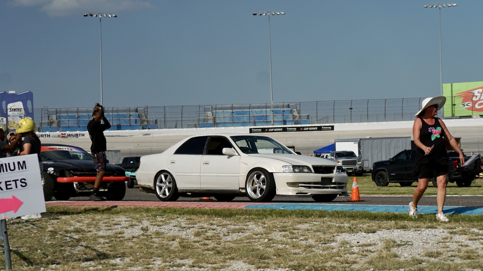 White sedan at the track