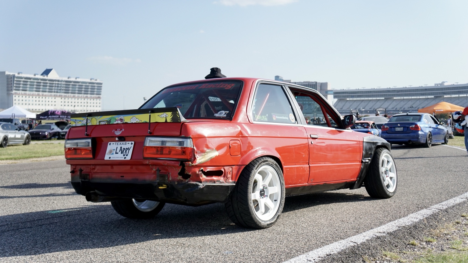 Red BMW at the paddock