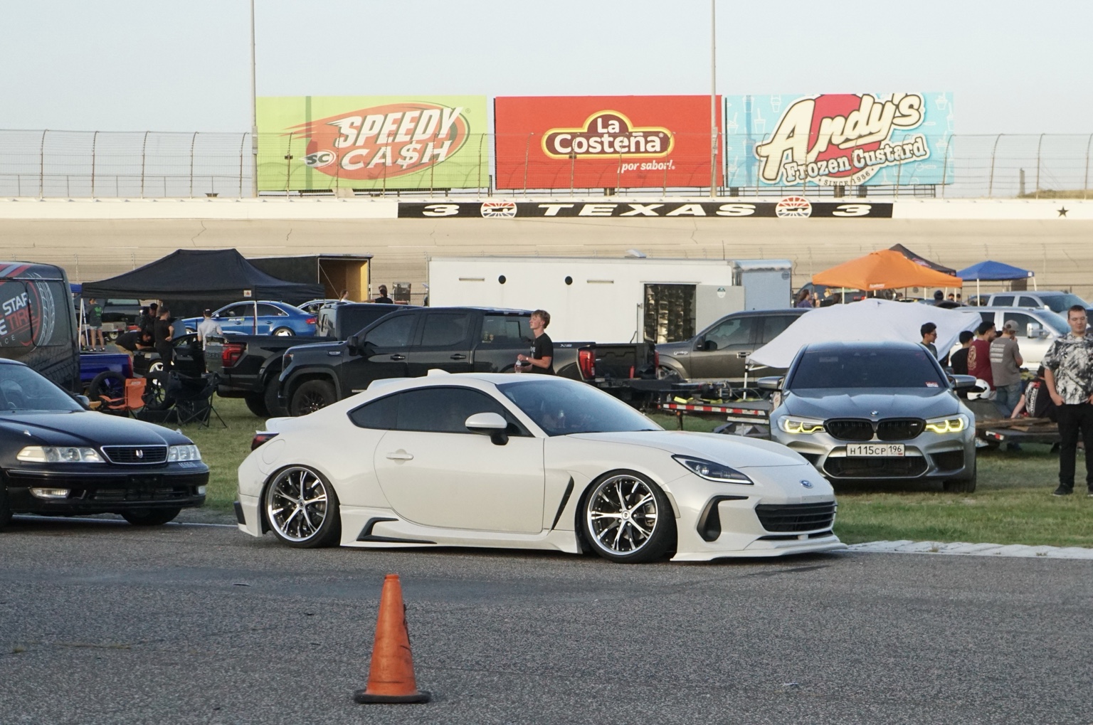 Modified white coupe at the car meet