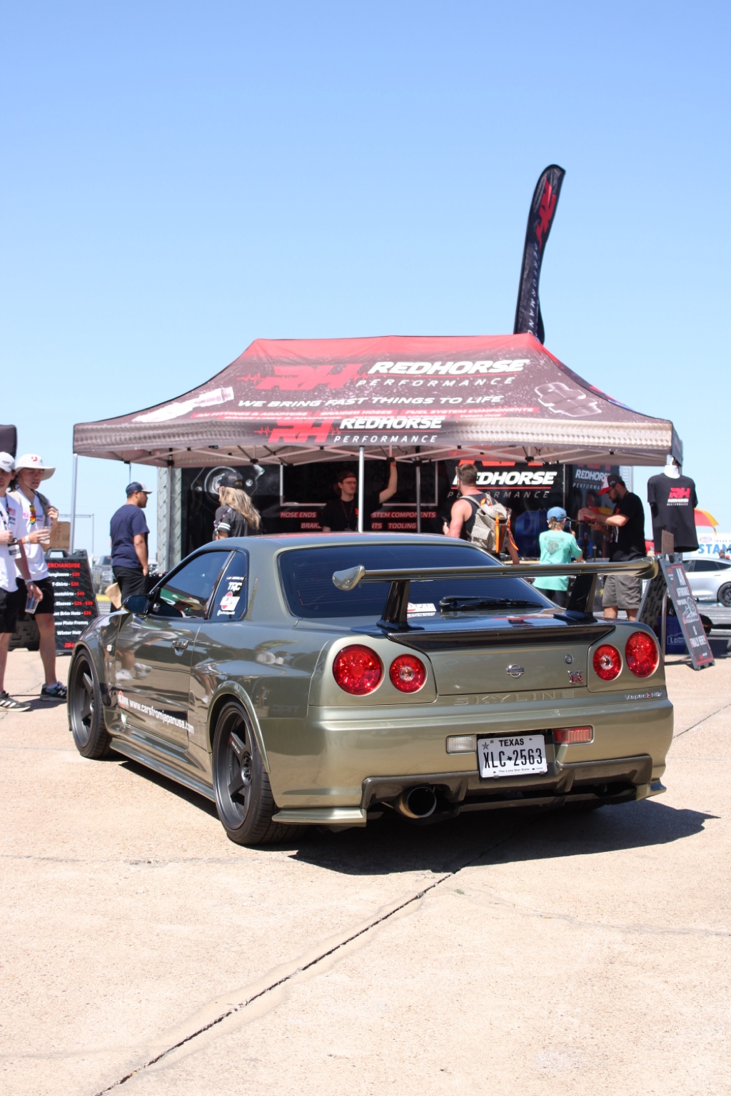 Green Nissan Skyline GT-R rear three-quarter view